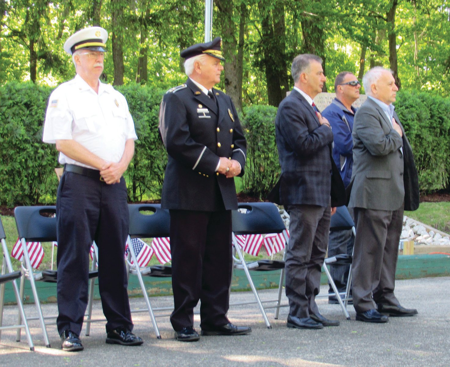 SUPER SALUTE: Johnston officials like Fire Chief Peter Lamb, former Police Chief Richard S. Tamburini, state Sen. Frank Lombardo and late Parks and Recreation Director Dan Mazzulla, helped honor the town’s lost military heroes at a 2019 Memorial Day ceremony. One of those heroes was U.S. Army First Lt. Anthony R. Mazzulla, who had been MIA since 1950.
